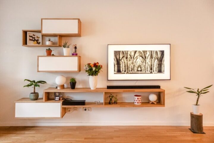 individual sideboard made of solid oak and MDF, fixed to the wall.